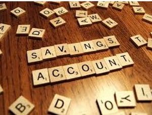 Scrabble pieces spell out "savings account," which is what ABLE accounts are.