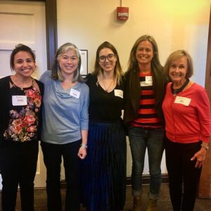 Five staff members who attended Beyond Diversity pose for photo