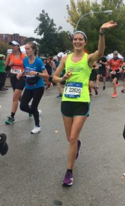 A Team CIF runner smiling on the Chicago Marathon course 2018