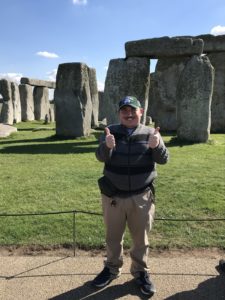 Jonathan standing in front of Stonehenge