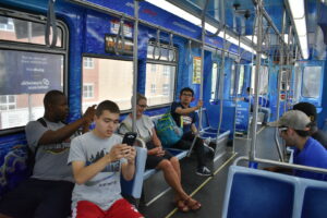 Travel the Town students exploring on the 'El' train